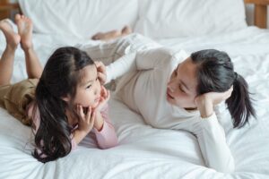 mother talking to daughter 