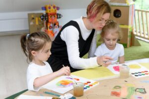Preschoolers Engaged in Classwork - Preschool Teacher Soft Skills 