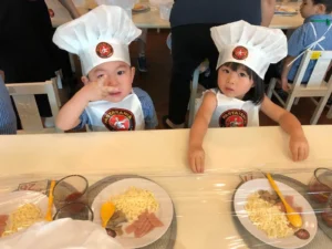 Kids making pasta at Pastamania - Educational Field Trips in Singapore
